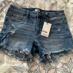 Distressed denim shorts